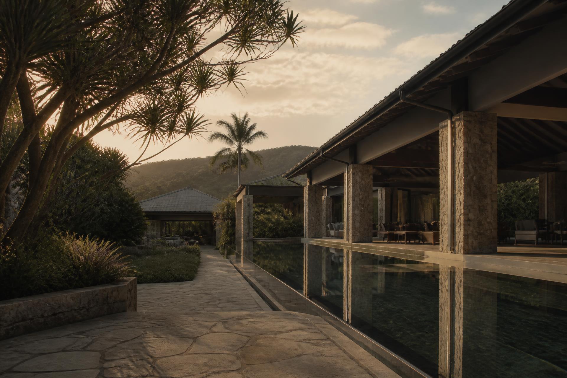 The exterior of a luxury private estate in the Byron Bay hinterland at dawn
